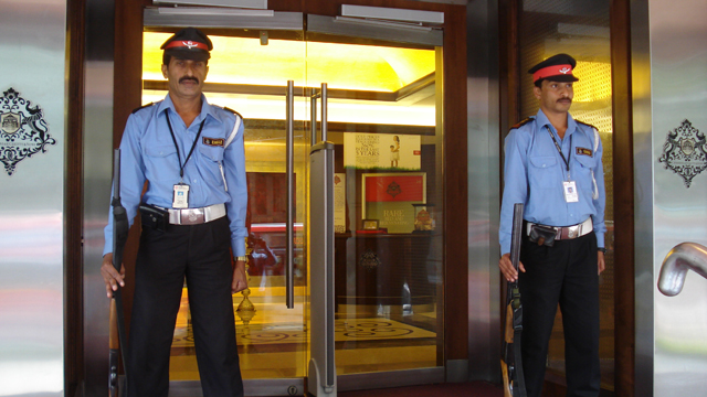 Armed Guards / Gun Men Guarding Jewellery Showroom